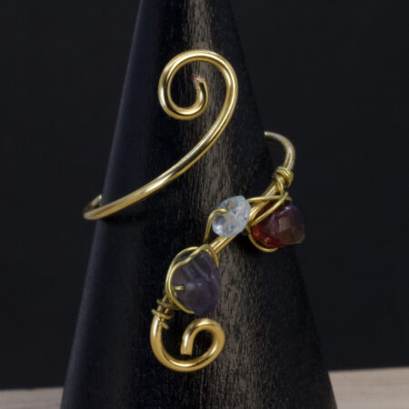 Anello in ametista, acquamarina e granato